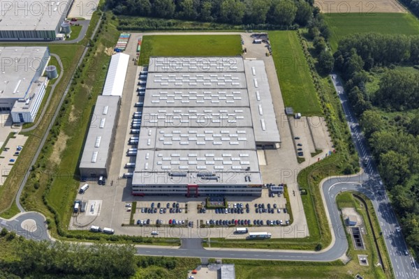 Aerial view, commercial area Lünener Straße at the motorway A2, Heldt Gebäudetechnik and DHL Ernst-von-Bodelschwingh-Street in Weddinghofen, Bergkamen, Ruhr area, North Rhine-Westphalia, Germany, DE, DHL Logistik, Europe, commercial enterprises, commercial area, commercial park, commercial location, commercial use, industrial area, industrial building, industrial location, aerial photograph, aerial photography, aerial photography, overview, bird's-eye view, birds-eyes view, overview