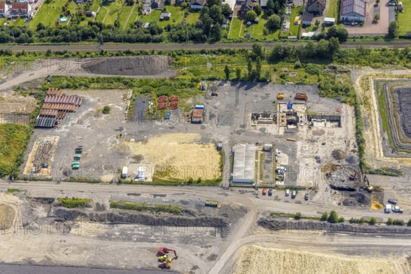 Aerial view, construction site for planned urban quarter Wasserstadt Aden on the site of the former Haus Aden colliery on the Datteln-Hamm Canal in Oberaden, Bergkamen, Ruhr area, North Rhine-Westphalia, Germany, construction work, construction area, building site, building plots, construction project, construction site, DE, Europe, canal, aerial view, aerial photography, aerial photography, new building, overview, bird's eye view, living and living, residential neighbourhood, birds-eyes view, overview