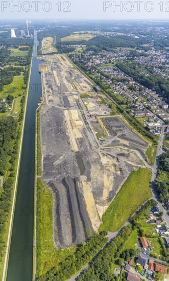 Aerial view, construction site for planned urban quarter Wasserstadt Aden on the site of the former Haus Aden colliery on the Datteln-Hamm Canal in Oberaden, Bergkamen, Ruhr area, North Rhine-Westphalia, Germany, construction work, construction area, building site, building plots, construction project, construction site, DE, Europe, canal, aerial view, aerial photography, aerial photography, new building, overview, bird's eye view, living and living, residential neighbourhood, birds-eyes view, overview