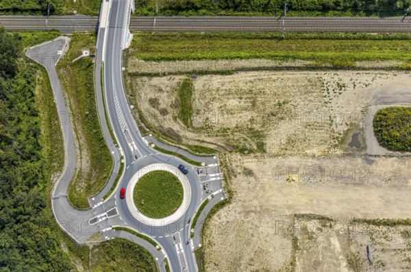 Aerial view, construction site and new roundabout at the Wasserstadt Aden in Oberaden, Bergkamen, Ruhr area, North Rhine-Westphalia, Germany, construction work, construction area, construction site, construction project, construction site, DE, Europe, shapes and colours, roundabout, roundabout, aerial photograph, aerial photography, aerial photography, new construction, overview, bird's-eye view, overview