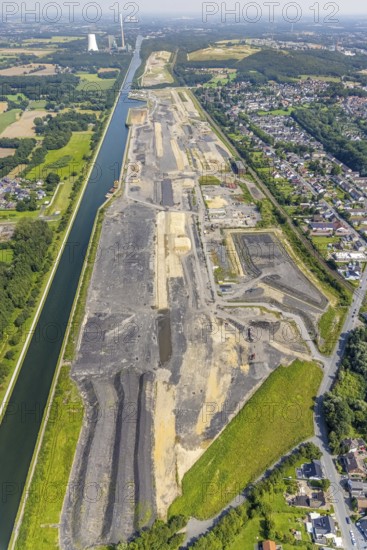 Aerial view, construction site for planned urban quarter Wasserstadt Aden on the site of the former Haus Aden colliery on the Datteln-Hamm Canal in Oberaden, Bergkamen, Ruhr area, North Rhine-Westphalia, Germany, construction work, construction area, building site, building plots, construction project, construction site, DE, Europe, canal, aerial view, aerial photography, aerial photography, new building, overview, bird's eye view, living and living, residential neighbourhood, birds-eyes view, overview