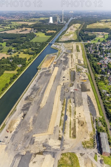 Aerial view, construction site for planned urban quarter Wasserstadt Aden on the site of the former Haus Aden colliery on the Datteln-Hamm Canal in Oberaden, Bergkamen, Ruhr area, North Rhine-Westphalia, Germany, construction work, construction area, building site, building plots, construction project, construction site, DE, Europe, canal, aerial view, aerial photography, aerial photography, new building, overview, bird's eye view, living and living, residential neighbourhood, birds-eyes view, overview