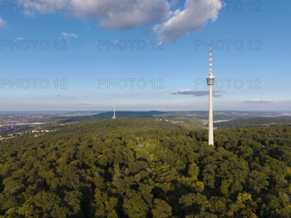 The television tower above a wooded area shows a clear sky and scattered clouds, Stuttgart-Degerloch, Baden-Württemberg, Germany