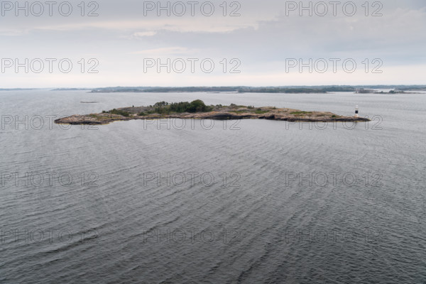 Skerry with a small lighthouse, Åland, Åland Islands, Finland