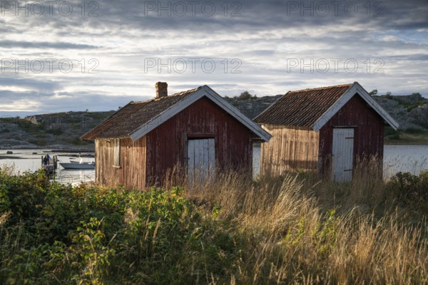 Falun red or Swedish red boathouses, Resö Island, Bohuslän, Skagerrak, Sotenäs, Västra Götalands län, Sweden
