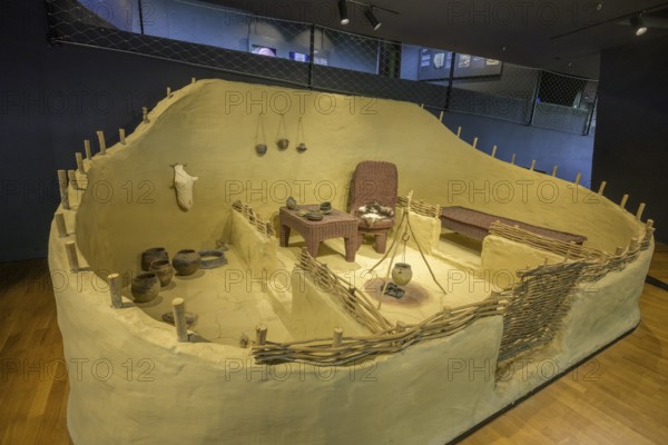 Reconstruction of a house with fireplace and furniture, Museum of Vucedol Culture, Vukovar, Vukovar-Srijem County, Croatia