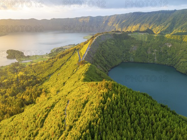Lake Santiago and Blue Lake. Sete Cidades Caldera at Sunset. Lush Green Hills with Trees. Azores, Sao Miguel Island. Portugal. Aerial View
