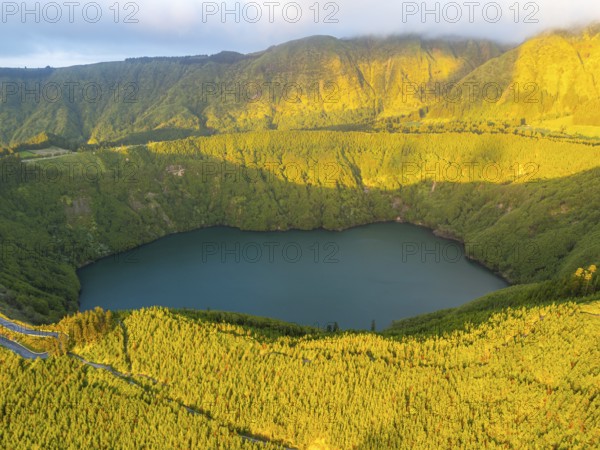 Lake Santiago. Sete Cidades Caldera at Sunset. Lush Green Hills. Azores, Sao Miguel Island. Portugal. Aerial View
