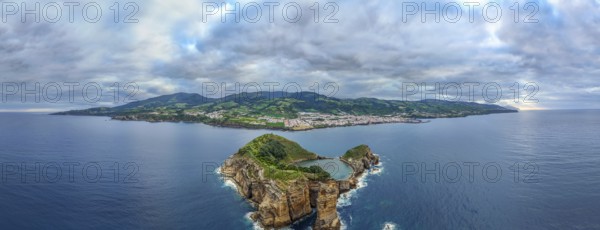 Horizontal Panorama of Vila Franca Islet, Vila Franca Do Campo Town, Dramatic Sky and Atlantic Ocean. Azores, Sao Miguel Island. Portugal. Aerial Drone Shot