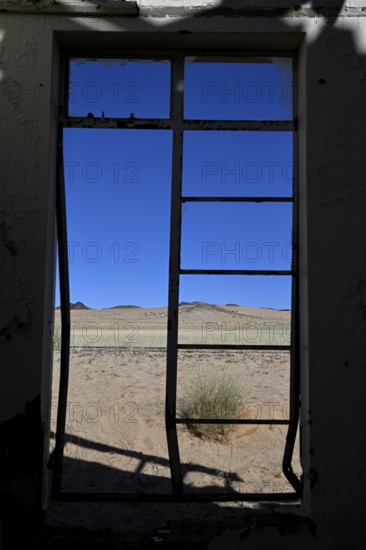 View from the window of the old German railway station of Garub into the Namib Desert, near Aus, Karas Region, Namibia