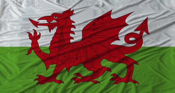 Welsh flag waving. Flag of Wales with cloth texture