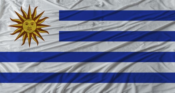 Uruguayan flag waving. Flag of Uruguay with cloth texture