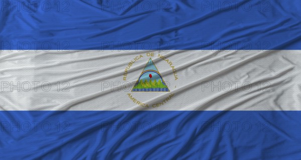 Nicaraguan flag waving. Flag of Nicaragua with cloth texture
