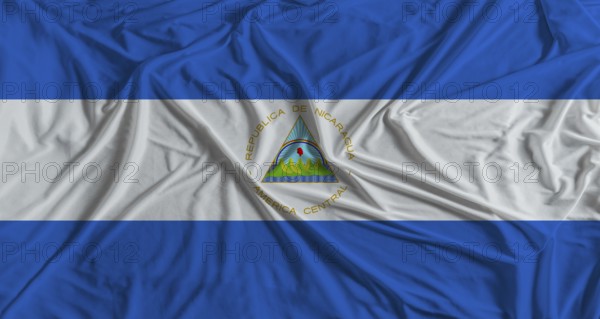 Nicaraguan flag with fabric texture background. National flag of Nicaragua