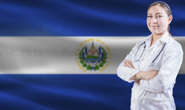 Female doctor on El Salvador flag. Doctor with crossed arms on El Salvador flag. El Salvador health and care concept