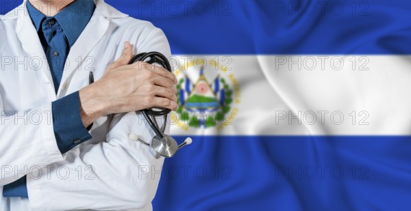 El Salvador healthcare concept. Doctor with stethoscope on El Salvador flag. Doctor holding stethoscope on Salvadoran flag