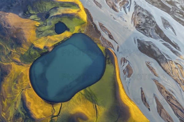 Turquoise crater lake and glacial river, Icelandic Highlands, Iceland