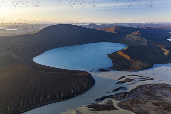 Turquoise crater lake Skyggnisvatn and glacial river, Icelandic Highlands, Iceland
