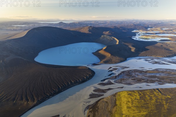 Turquoise crater lake Skyggnisvatn and glacial river, Icelandic Highlands, Iceland