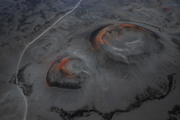 Red craters in black sand desert, Icelandic Highlands, Iceland