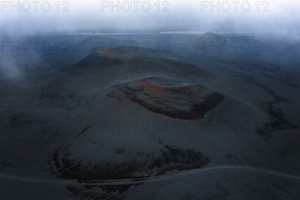 Red craters in black sand desert, Icelandic Highlands, Iceland
