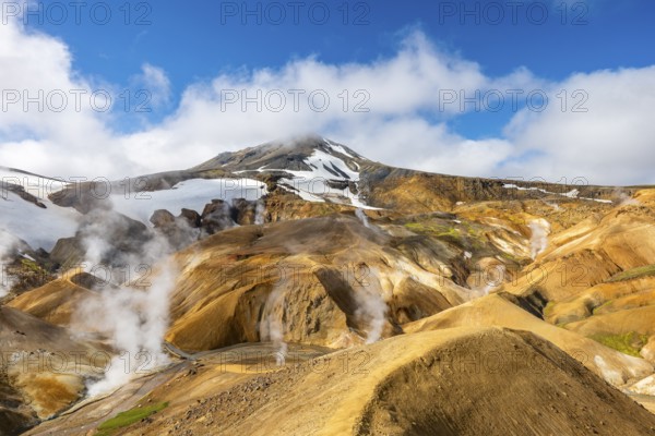 Steaming springs and colourful rhyolite mountains, Hveradalir geothermal area, Kerlingarfjöll, Icelandic Highlands, Iceland
