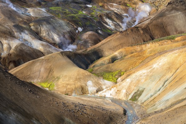 Steaming springs and colourful rhyolite mountains, Hveradalir geothermal area, Kerlingarfjöll, Icelandic Highlands, Iceland