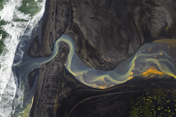 Interwoven river with colourful sediments, South Iceland, Iceland