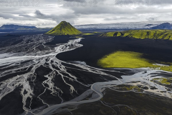 Moss-covered mountain Mælifell, Maelifell, behind glacier Myrdalsjökull, Icelandic Highlands, Iceland