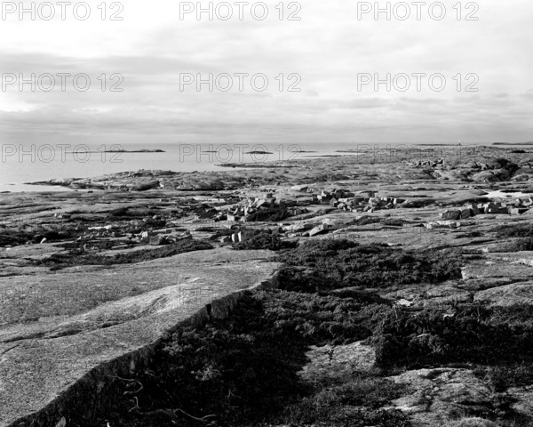 Rocky landscape in the Ramsvikslandet nature reserve, the sea in the background, black and white, analogue, Bohuslän, Västra Götaland, Sweden