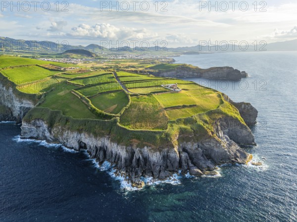 Cape Cintrao, Cliffs, Green Hills, Fields and Atlantic Ocean. Azores, Sao Miguel Island. Portugal. Aerial View