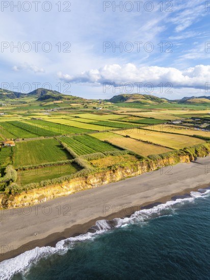 Santa Barbara Beach, Green Lush Fields with Pasturelands and Atlantic Ocean. Azores, Sao Miguel Island. Portugal. Aerial View