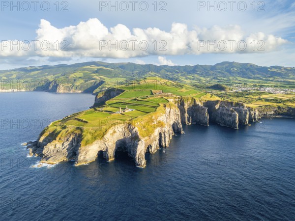 Cape Cintrao, Cliffs, Green Lush Hills, Fields, Pasturelands and Atlantic Ocean. Azores, Sao Miguel Island. Portugal. Aerial View