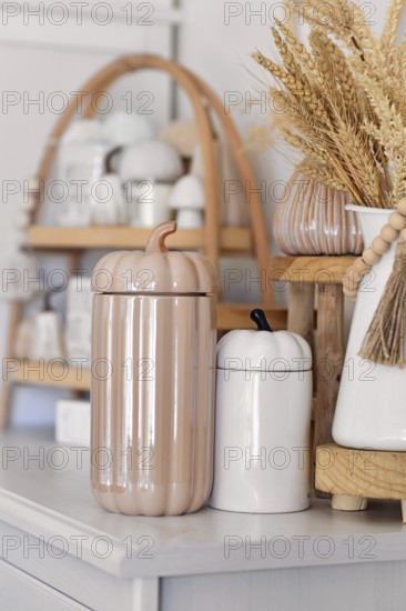 Boho autumn home decor with ceramic pumpkin jars