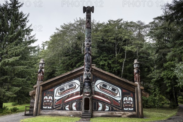 Totem poles at a Tlingit Clan House, Totem Bight State Historical Park, Ketchikan, Alaska, USA