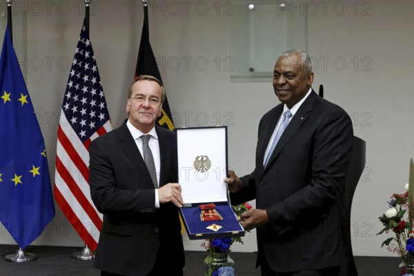 Federal Minister of Defence Boris Pistorius with Lloyd James Austin III former United States Secretary of Defence 2021 to 2025 and Order of Merit - Award of the Order of Merit of the Federal Republic of Germany to Lloyd James Austin III in recognition of his personal commitment to strengthening German-American friendship and bilateral defence and military policy cooperation at the Federal Ministry of Defence, Berlin, 01.10.25