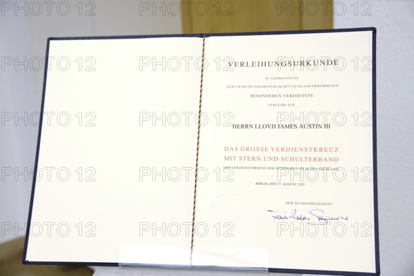 Feature: Award certificate - Award of the Order of Merit of the Federal Republic of Germany to Lloyd James Austin III in recognition of his personal commitment to strengthening German-American friendship and bilateral defence and military policy cooperation at the Federal Ministry of Defence, Berlin, 01.10.25