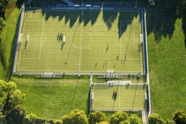 Aerial view, Sportzemtrum Ost Hammer SpVg 03/04 e.V., training games and shadow cast by the evening sun, centre, Hamm, Ruhr area, North Rhine-Westphalia, Germany, DE, Europe, football, football pitch, football stadium, aerial view, aerial photography, aerial photography, shadow, sport, sports facility, sports field, overview, bird's-eye view, overview