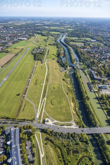 Aerial photograph, Hamm-Lippewiesen airfield and the Datteln-Hamm canal and Lippe river experience area, Hamm Mattenbecke sewage treatment plant and Hamm lock, Heessen district, Hamm, Ruhr area, North Rhine-Westphalia, Germany, DE, Europe, flight emission, airport, aircraft noise, airfield, sewage treatment plant, runway, aerial photograph, aerial photography, aerial photography, lock, runway, overview, bird's-eye view, bird's-eye view, overview