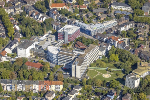 Aerial view, Johanniter-Kliniken Hamm Evangelisches Krankenhaus Hamm, Seniorencampus Baustelle mit Neubau an der Werler Straße Ecke Blumenstraße, Mitte, Hamm, Ruhr Area, North Rhine-Westphalia, Deutschland, Altenheim, Altenwohnheim, Altersheim, Bauarbeiten, Baugebiet, Baugelände, Baugrundstücke, Baumaßnahme, Bauprojekt, Baustelle, Betreuung und Pflege, DE, Europa, healthcare, hospital, heliport, clinic, hospital, hospital, aerial photography, aerial photography, medical facility, medical aid, new building, care facility, retirement home, retirement residence, retirement home, retirement centre, overview, bird's-eye view, overview, medical care