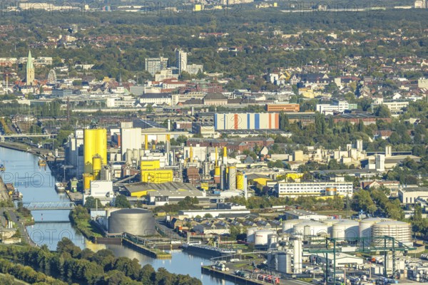 Aerial view, harbour with Voestalpine Boeler and view to the city with St. Paul's Church, district Herringen, Hamm, Ruhr area, North Rhine-Westphalia, Germany, place of worship, DE, Europe, religious community, place of worship, harbour, harbour area, harbour area, holy place, church, church community, denomination, aerial view, aerial photography, aerial photography, religion, religious site, overview, bird's-eye view, overview