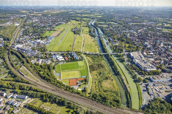 Aerial photograph, Hamm-Lippewiesen airfield and the Datteln-Hamm canal and Lippe river experience area, Hamm Mattenbecke sewage treatment plant and Hamm lock, Heessen district, Hamm, Ruhr area, North Rhine-Westphalia, Germany, DE, Europe, flight emission, airport, aircraft noise, airfield, sewage treatment plant, runway, aerial photograph, aerial photography, aerial photography, lock, runway, overview, bird's-eye view, bird's-eye view, overview