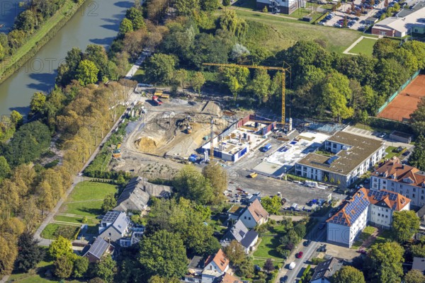 Aerial view, Rietzgarten new building residential complex Brändströmstraße, centre, Hamm, Ruhr area, North Rhine-Westphalia, Germany, construction area, construction site, construction crane, construction measure, construction site, DE, Europe, property tax, Hammer gemeinnützige Baugesellschaft (HGB), real estate, aerial photograph, aerial photography, aerial photography, overview, bird's-eye view, residential complex, living and living, residential area, residential buildings, residential quality, residential quarter, housing estate, birds-eyes view, overview