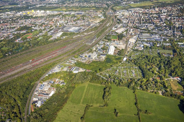 Aerial view, marshalling yard Hamm, industrial area Östingstraße, view to the harbour, railway station Hbf and to the city centre, KGV allotment garden association Bahn-Landwirtschaft Essen e.V. and zoo, transmitter Hamm telecommunication tower, district Pelkum, Hamm, Ruhr area, North Rhine-Westphalia, Germany, DE, Europe, commercial enterprise, commercial space, commercial area, commercial property, commercial site, commercial use, railway tracks, railway tracks, goods trains, industrial area, industrial site, aerial view, aerial photography, aerial photography, overview, bird's-eye view, birds-eyes view, overview