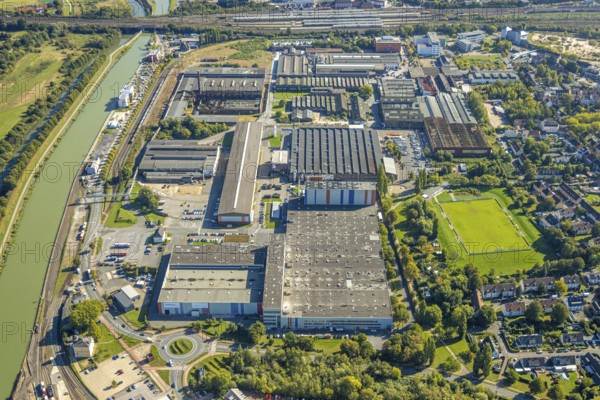 Aerial view, harbour at the Datteln-Hamm canal, industrial area Hafenstraße and Dortmunder Straße, voestalpine Böhler plant, centre, Hamm, Ruhr area, North Rhine-Westphalia, Germany, DE, Europe, commercial enterprise, commercial area, commercial property, commercial site, commercial use, harbour, harbour area, harbour area, harbour overview, industrial area, industrial site, aerial view, aerial photography, aerial photography, overview, bird's eye view, birds-eyes view, overview