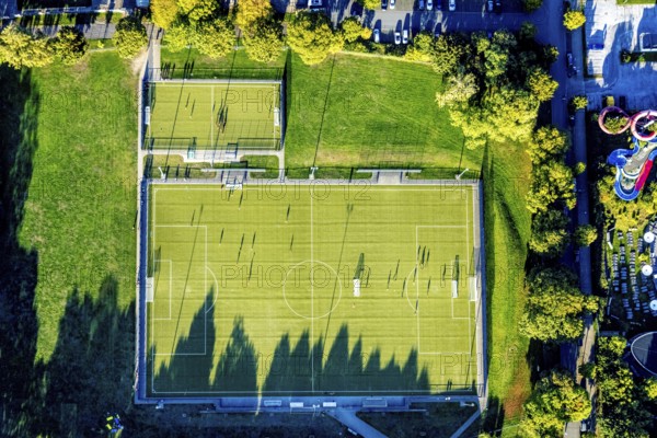 Aerial view, Sportzemtrum Ost Hammer SpVg 03/04 e.V., training games and shadow cast by the evening sun, centre, Hamm, Ruhr area, North Rhine-Westphalia, Germany, DE, Europe, football, football pitch, football stadium, aerial view, aerial photography, aerial photography, shadow, sport, sports facility, sports field, overview, bird's-eye view, overview