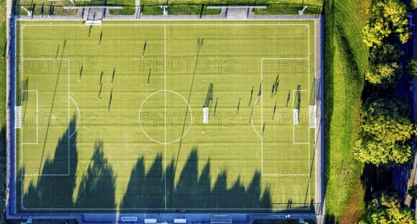 Aerial view, Sportzemtrum Ost Hammer SpVg 03/04 e.V., training games and shadow cast by the evening sun, centre, Hamm, Ruhr area, North Rhine-Westphalia, Germany, DE, Europe, football, football pitch, football stadium, aerial view, aerial photography, aerial photography, shadow, sport, sports facility, sports field, overview, bird's-eye view, overview