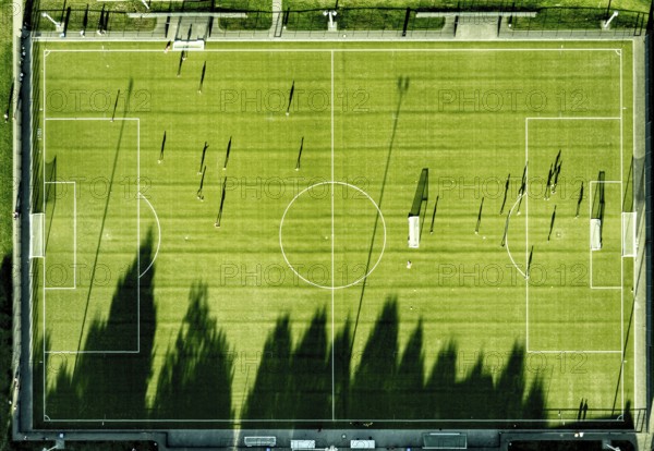 Aerial view, Sportzemtrum Ost Hammer SpVg 03/04 e.V., training games and shadow cast by the evening sun, centre, Hamm, Ruhr area, North Rhine-Westphalia, Germany, DE, Europe, football, football pitch, football stadium, aerial view, aerial photography, aerial photography, shadow, sport, sports facility, sports field, overview, bird's-eye view, overview