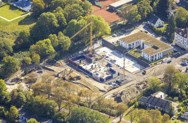 Aerial view, Rietzgarten new building residential complex Brändströmstraße, centre, Hamm, Ruhr area, North Rhine-Westphalia, Germany, construction area, construction site, construction crane, construction measure, construction site, DE, Europe, property tax, Hammer gemeinnützige Baugesellschaft (HGB), real estate, aerial photograph, aerial photography, aerial photography, overview, bird's-eye view, residential complex, living and living, residential area, residential buildings, residential quality, residential quarter, housing estate, birds-eyes view, overview