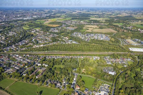 Aerial view, residential area Am Heimshof, railway line and forest area, new construction residential area Sachsenring, district Heessen, Hamm, Ruhr area, North Rhine-Westphalia, Germany, railway area, DE, Deutsche Bahn AG, Europe, railway tracks, tracks, property tax, real estate, aerial view, aerial photography, aerial photography, overview, bird's eye view, residential area, living and life, residential area, quality of life, residential quarter, housing estate, residential area, birds-eyes view, overview